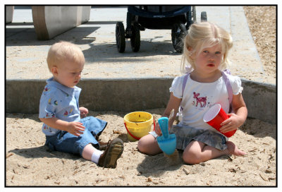 Emily and Joshua playing in the sand box