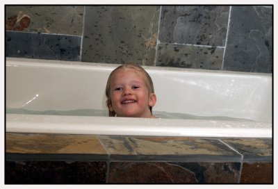 Emily enjoying a very deep luxurious bath tub in Tahoe