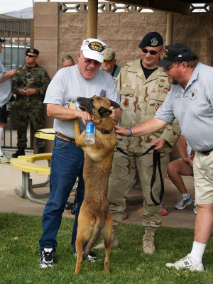 Risse and J.D. with dog and TSgt Rhoads