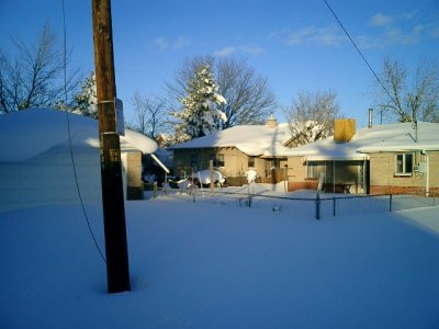 This is the back of our house. It's the one in the middle with the big snow drift above the window.