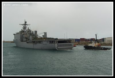 USS Comstock with Tug