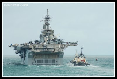 USS Boxer with Two Tugs
