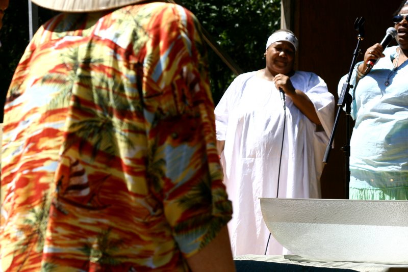 coming forward to bless ourselves with water