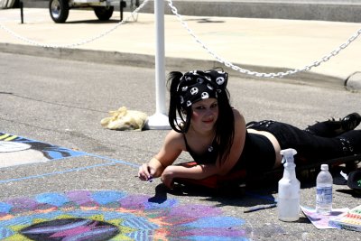 Courtney Neynaber of Clarkston High School works on a mandala chalk painting