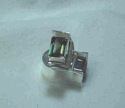 very large (10 x 14 mm) faceted topaz stones bezel-set in sterling (SOLD)