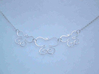Three delicate hammered butterflies are the centre-piece of this necklace.  It can be worn at either 17 or 19 (42cm or 47cm). Sold