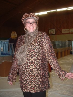 Camilla in her leopard dress and hat