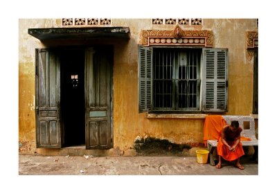 Monk on bench, Laos