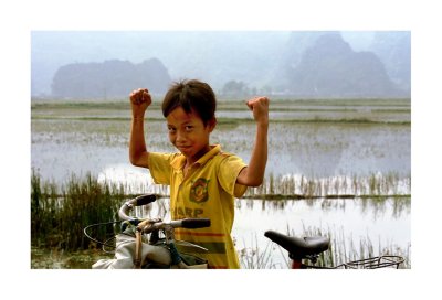 Boy with bicycle, Vietnam