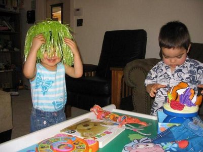 Wearing our cool clothes from the Gewerths and playing with other gifts