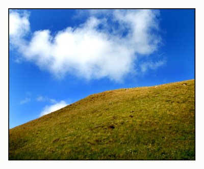 Hill and sky.