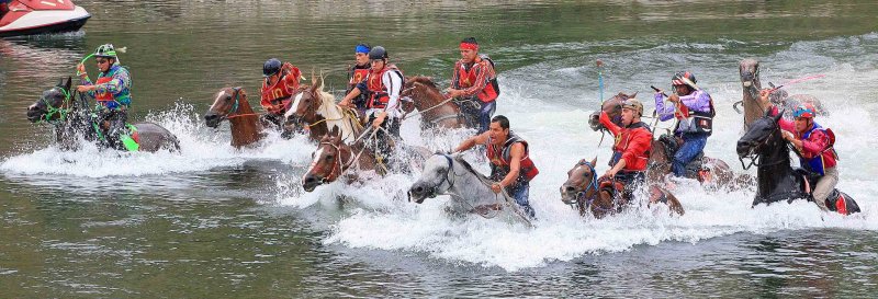  Brawn  And Muscle As Horses And Men Ride Across River