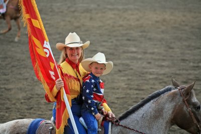 Young Cowboy And Proud Mom