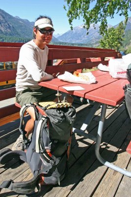  PCT Hiker  Tiki Enjoying  Food In Stehekin After hiking 2470 Miles