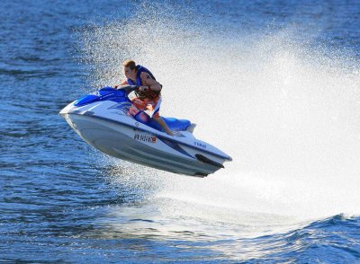 Jet Skies Riding Our Boats Wake....