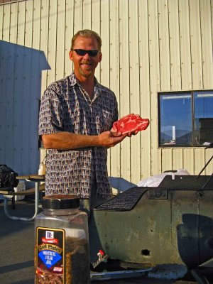 Safety Committee Member  Don Cook Gets Ready To Grill Steak