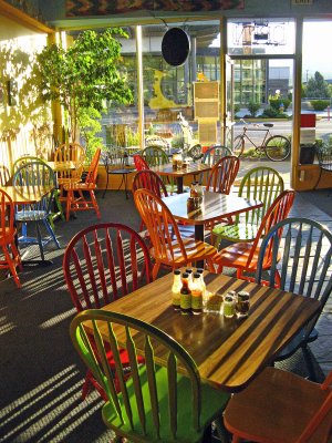  Special Note: see my great old english 3 speed Raliegh in the background,,,love it. Stopped in for coffee and a sweet bread before work,,, downtown Wenatchee.... Love the morning light shadows through the chairs...