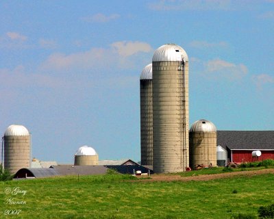 Barns and silos dot the countryside.