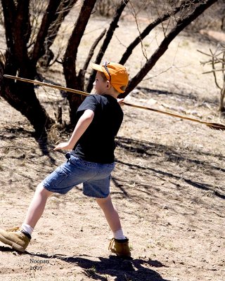 Spear throwing at mammoth targets.