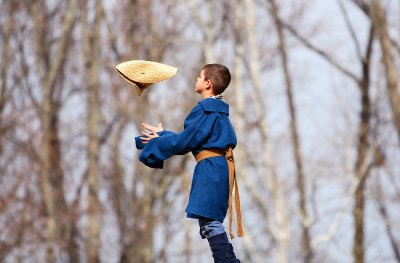 The Boy With The Levitating Hat