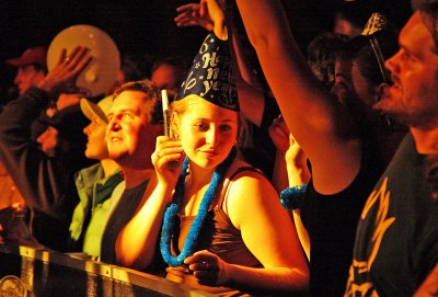 Serene Woman In Blue Party Hat