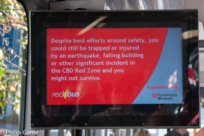 Safety warning aboard the Red Zone tour bus
