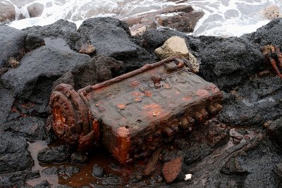 Yes, that is quite a rusted engine block laying on the shore