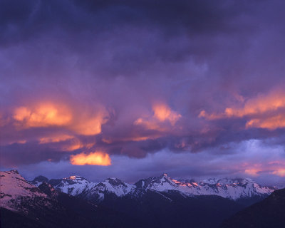 Sunrise Over Stormy Mountains