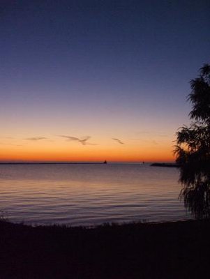 Still water and orange sky