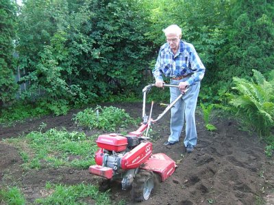 (007) dad cultivating his garden .jpg