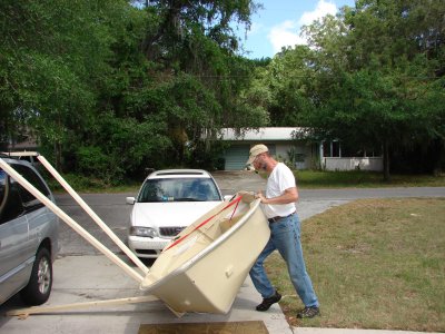 Rolling the dinghy into lifting position