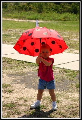 Kylie and her ladybug umbrella