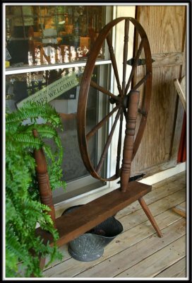 Spinning wheel on the porch