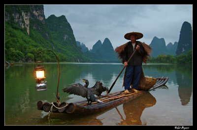 Li River cormorant fisherman at dawn, Guangxi.