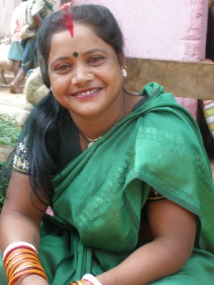 Woman in green, Sanjay Bazaar