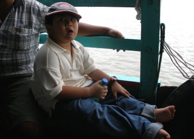 Fat brat on ferry to Port Klang