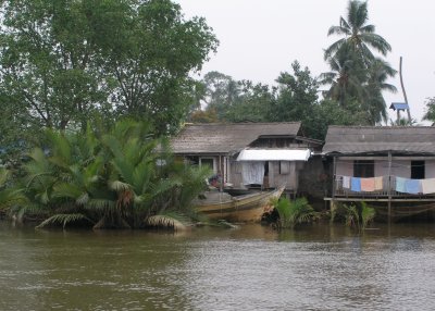 Houses on riverbank, KT