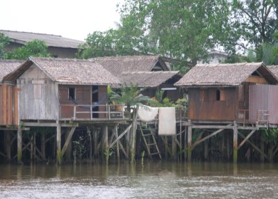 Houses built over river, KT