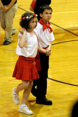 Not happy to be caught dancing with a girl