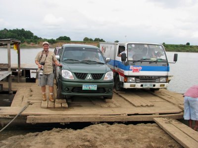 EXCITED RAFT PASSENGER. Neon strikes another pose aboard the rickety raft as it docks at the other bank of the Cagayan River.