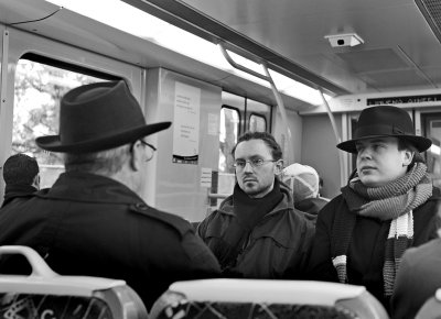 Men with Hats on Trains