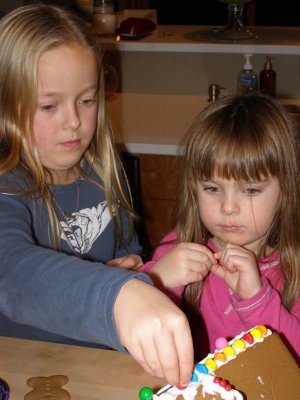 Ashley and Carly Building a Gingerbread House