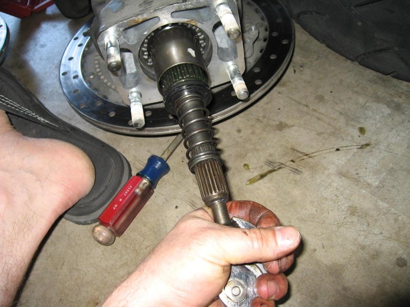 If you arent going to re-use the old drive, you can remove the input shaft to use to help you guide drive shaft into place