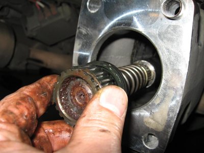 I used the input shaft from my old drive to help me guide the front of the driveshaft onto the output shaft of the transmission
