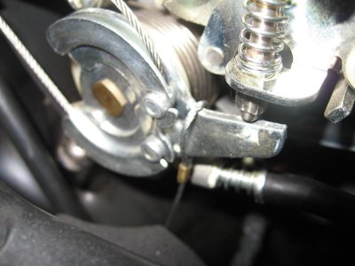 I hooked the shorter looped cable over the end of the throttle pulley
