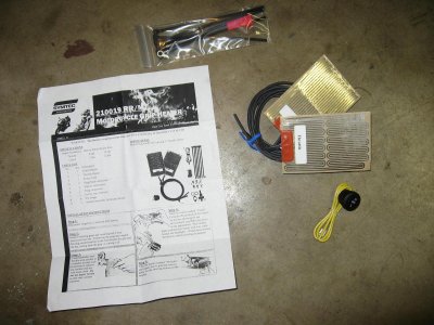 Kit includes wiring, switch, instructions, and two grip heaters