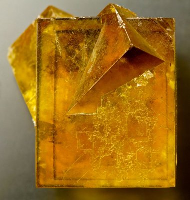 Amber-coloured transparent fluorite penetration twin, 22 mm on edge, Hilton Mine, Scordale, North Pennines, Cumbria, England. 
