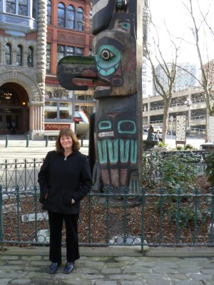 Julie by totem pole in Pioneer Square