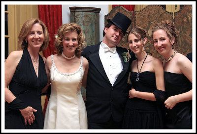 A Wedding Portrait of Groom, the Bride, Her Sister and Sister's Daughters