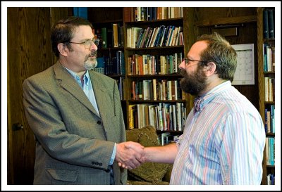 Rabbi Swartz Shaking Hands with Board Member